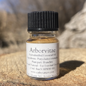 a bottle of arborvitae essential oil